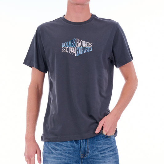 Person wearing a navy blue t-shirt with text on a white background