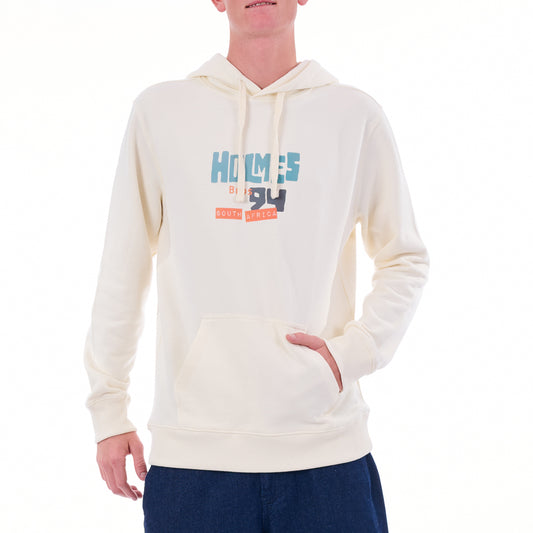 Person wearing a cream hoodie with text on a white background