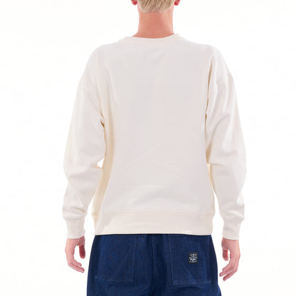 Person wearing a white sweatshirt and blue pants on a white background