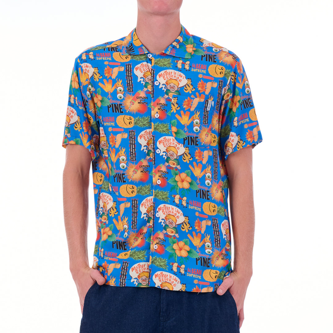 Person wearing a colorful patterned shirt on a white background