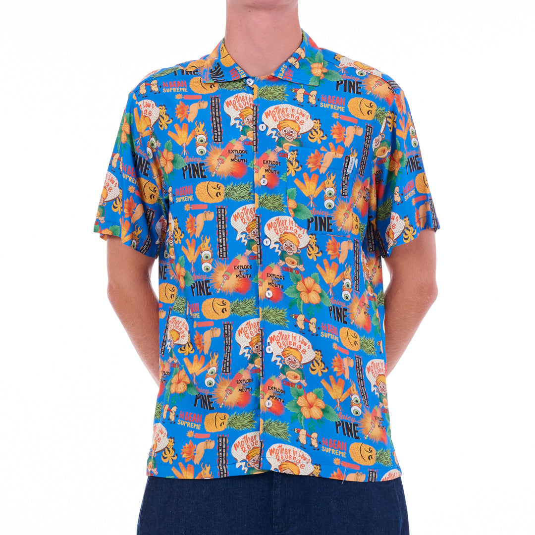 Person wearing a colorful patterned shirt on a white background