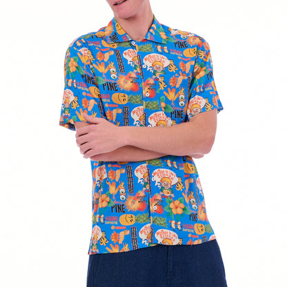 Person wearing a colorful patterned shirt on a white background