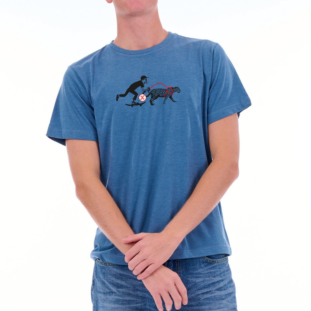 Person wearing a blue t-shirt with a graphic design on a white background