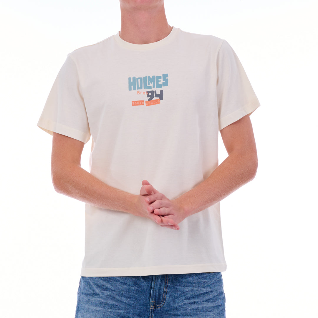 Person wearing a white t-shirt with 'Holmes 94' text and graphics on a white background