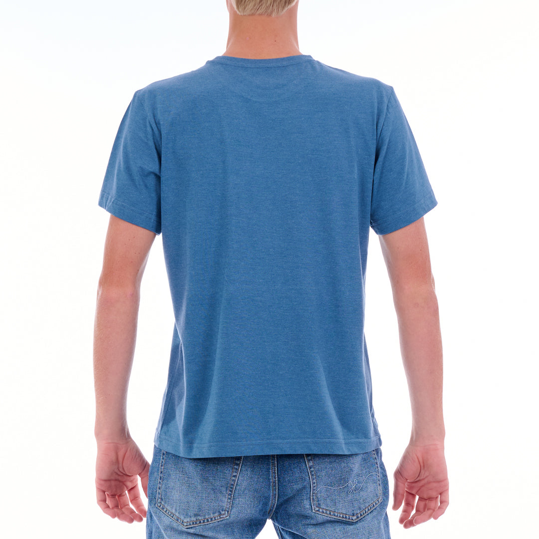 Person wearing a blue t-shirt and jeans on a white background