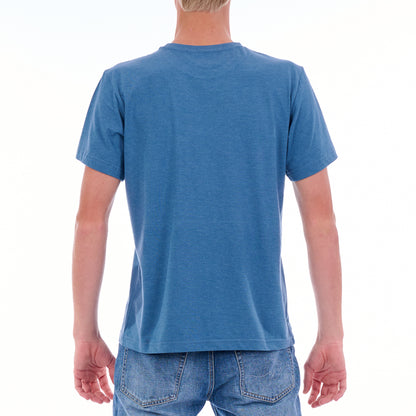 Person wearing a blue t-shirt and jeans on a white background